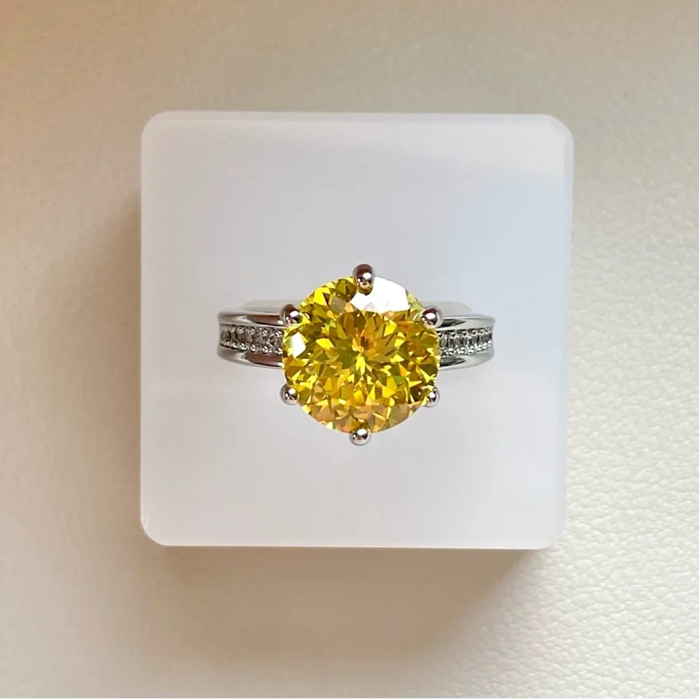 Sterling Silver Ring with Yellow Round Center Stone